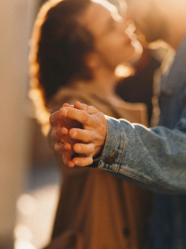 Couple dancing holding hands